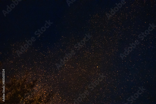 Fire embers particles over black background. Fire sparks background. Czech © Oksana