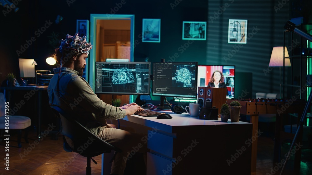 Engineer with EEG headset inserting cartridge into PC to use high tech software allowing for brain transfer into virtual world. Man putting disk in computer to start consciousness upload, camera B Engineer with EEG headset inserting cartridge into PC to use high tech software allowing for brain transfer into virtual world. Man putting disk in computer to start consciousness upload, camera B