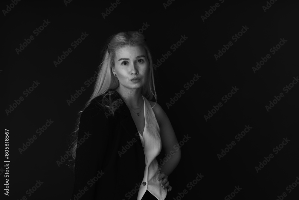 Black and white low key portrait of beautiful young blonde woman Black and white low key portrait of beautiful young blonde woman