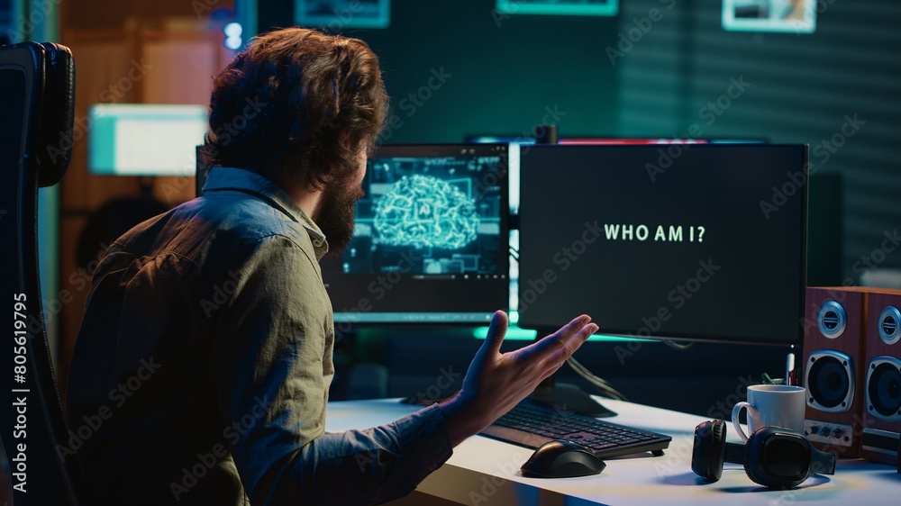 Happy programmer celebrating after managing to make AI become sentient and ask questions about itself. Ecstatic developer punching desk in excitement after achieving AI singularity, camera A Happy programmer celebrating after managing to make AI become sentient and ask questions about itself. Ecstatic developer punching desk in excitement after achieving AI singularity, camera A