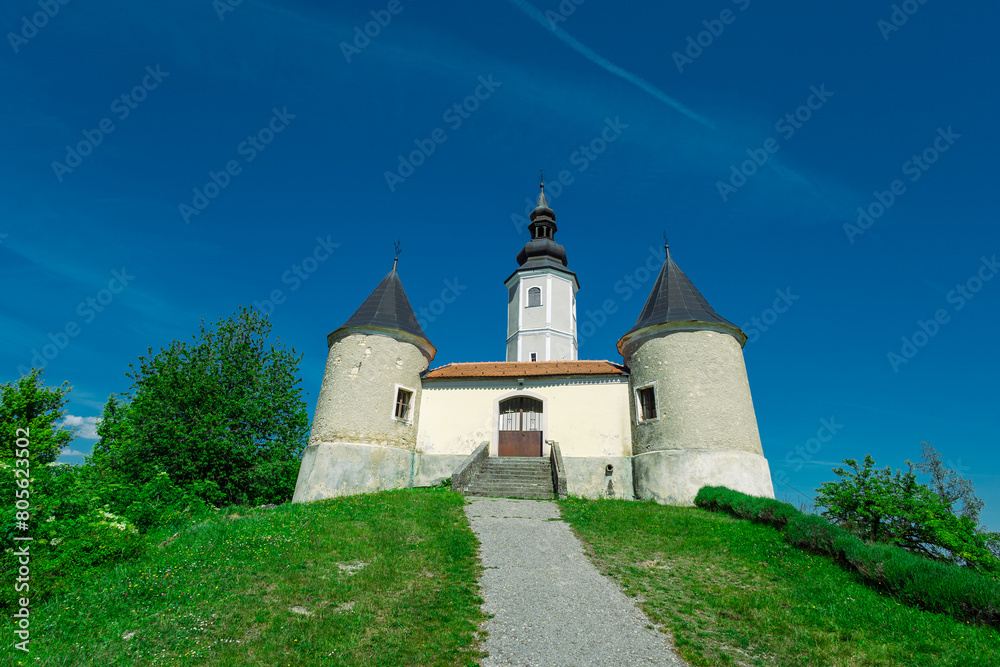 Church at Vinagora, croatian Zagorje, on a sunny day. Church of the Mother of God on top of the hill, Entrance view of the church from outside