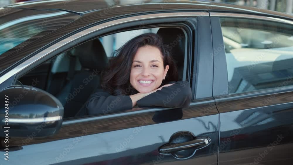Pretty driver in automobile ready to trip Pretty driver in automobile ready to trip