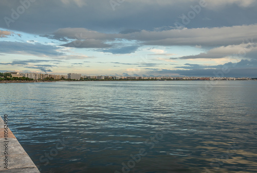 Promenade along Nikis Avenue in Thessaloniki city, Greece. White Tower on background photo