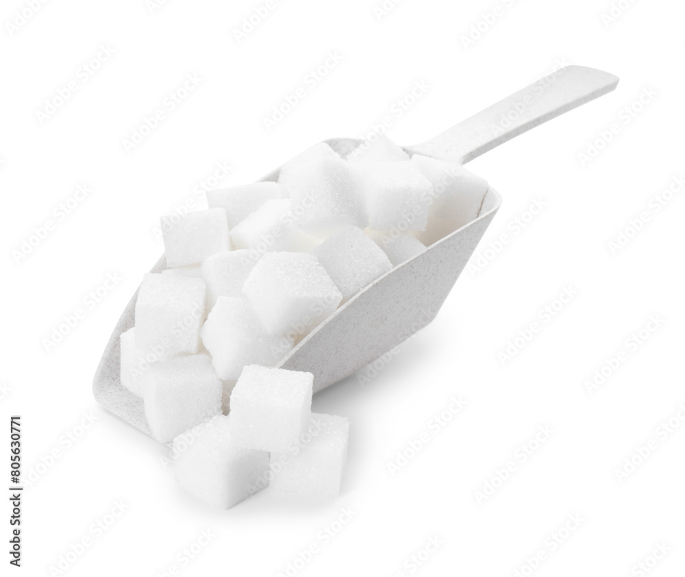 Sugar cubes in scoop isolated on white Sugar cubes in scoop isolated on white