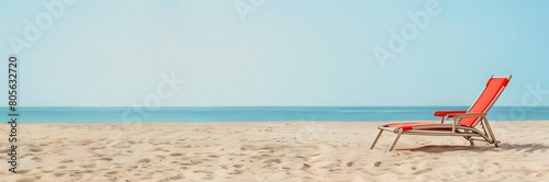 Beach chair recliner web banner. Beach chair recliner isolated on sandy background with copy space.