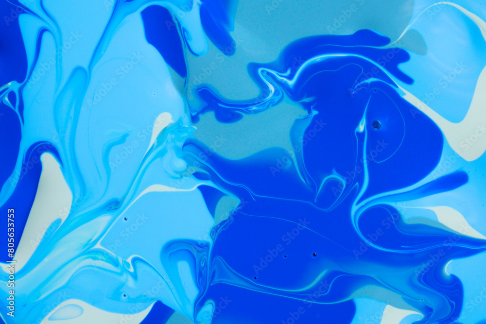 Mixed blue nail polishes as background, top view Mixed blue nail polishes as background, top view
