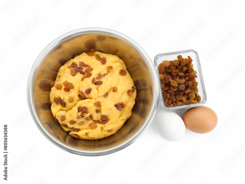 Dough with raisins in bowl and eggs isolated on white, top view Dough with raisins in bowl and eggs isolated on white, top view