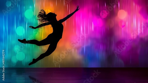 Silhouette of a dancer leaping gracefully