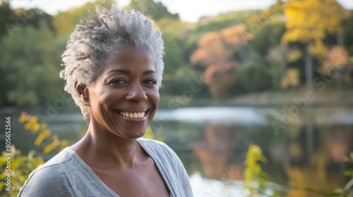 portrait of a happy and smiling mature african american woman outside