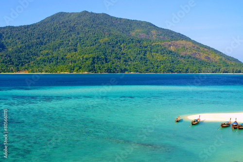 Crystal blue water and beautifull green island in Andman sea. Ko Turatao National Marine Park, Thailand