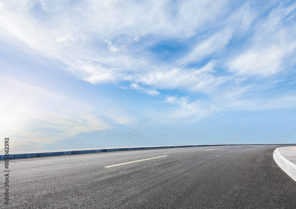 Asphalt background beneath a cloudless sky.