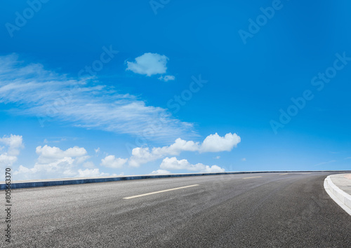 Graphic design background featuring a car on an asphalt road highway © Supreme