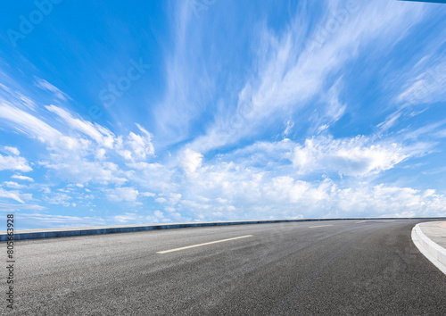 Graphic design asphalt background featuring an empty panoramic road