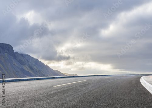 Graphic design asphalt background featuring an empty panoramic road