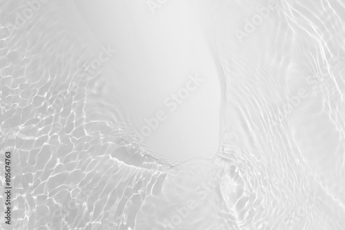 White water with ripples on the surface. Defocus blurred transparent white colored clear calm water surface texture with splashes and bubbles. Water waves with shining pattern texture background. © Water 💧 Shining 📸