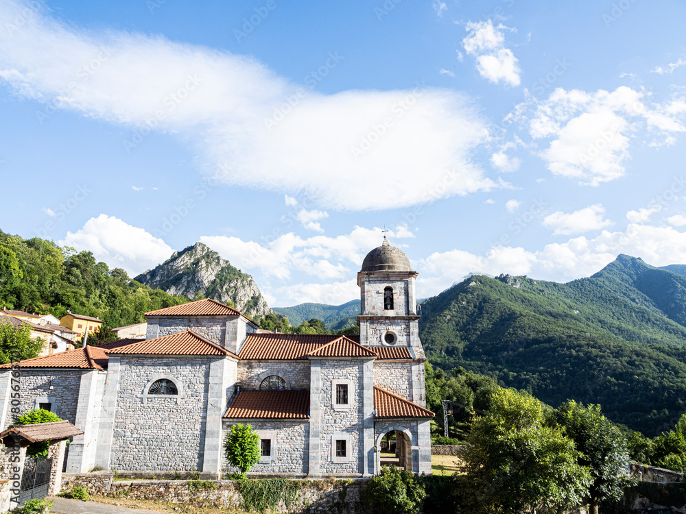 Church of the Assumption of Our Lady with the picos de europa in the background, Oseja de Sajambre, Castilla y León Community, León Province, Spain. Church of the Assumption of Our Lady with the picos de europa in the background, Oseja de Sajambre, Castilla y León Community, León Province, Spain.