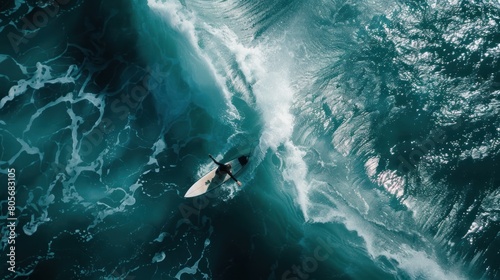 Professional surfer is surfing in the sea during big waves