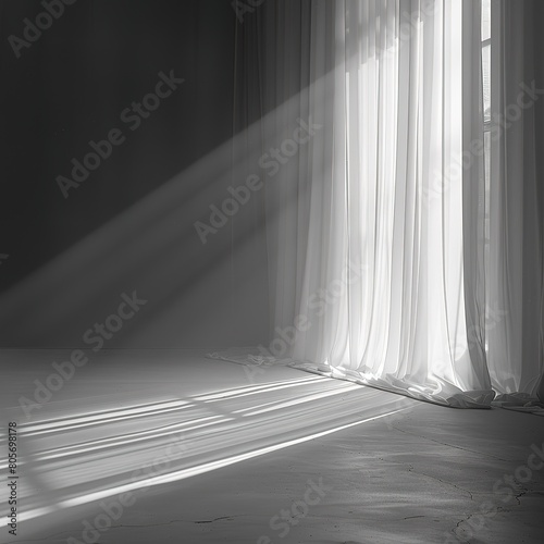  An empty background in darkness  an empty stage or studio  a soft light enters through a window creating the focusing effect necessary for product presentation.