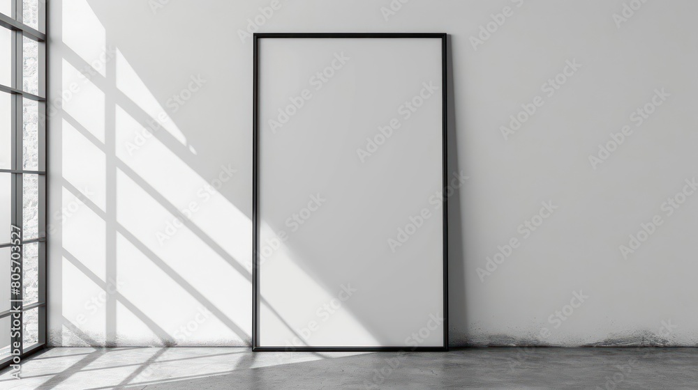 Poster mockup with vertical black frame in white wall interior background Poster mockup with vertical black frame in white wall interior background