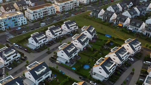 Aerial View of Modern Detached Houses in Energy-saving Construction and Modern Standards in a German Suburb.