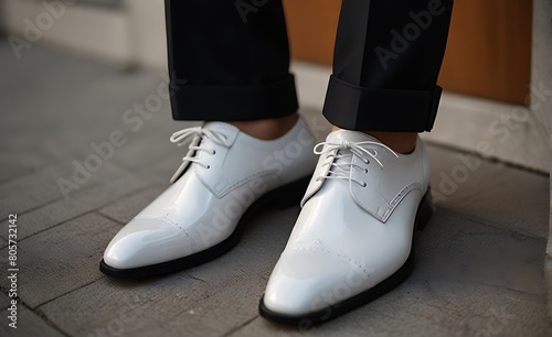 Close-up of Modern  Classic Men s Shoes on Urban Street  A Dapper Gentleman in Business Suit Amid Highrise Buildings