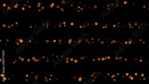 Orange color bubbles particles appearing disappearing over background photo