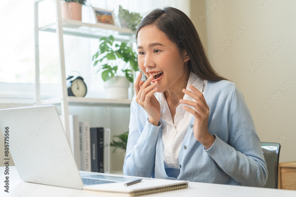 Excited with computer, happy celebrating success asian young woman, girl amazed looking good news at pc, laptop on desk at home office, get win online lottery, student winner celebrating achievement. Excited with computer, happy celebrating success asian young woman, girl amazed looking good news at pc, laptop on desk at home office, get win online lottery, student winner celebrating achievement.