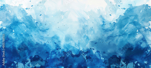 A blue and white background with splatters of paint