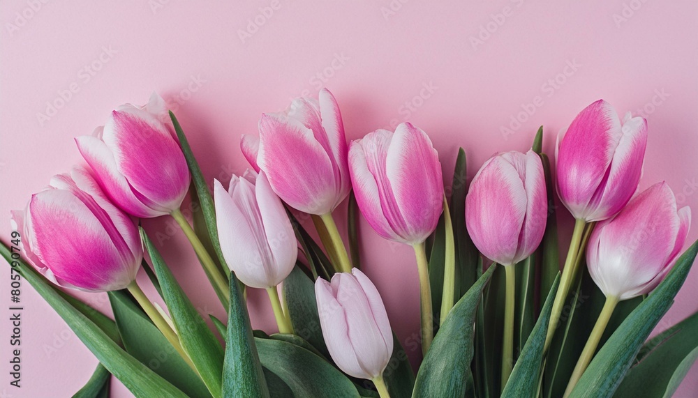 Fototapeta premium Beautiful composition spring flowers. Bouquet of pink tulips flowers on pastel pink backgrou
