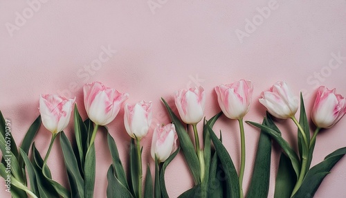 Beautiful composition spring flowers. Bouquet of pink tulips flowers on pastel pink backgrou #805790757