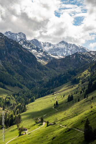 Alpine mountain landscape: View into the Habersauertal up to the Stripsenkopfjoch (1807 m) in the Kaisergebirge, Mountains in Tyrol, Austria in spring. Alpine mountain hike or mountain bike tour © Sandra Alkado