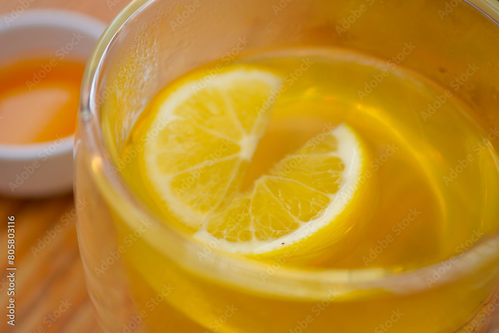 Top view of lemon tea pouring in a cup Top view of lemon tea pouring in a cup