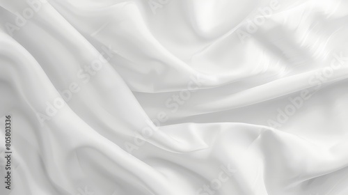 A tight shot of a soft, white fabric with a smooth, undulating texture