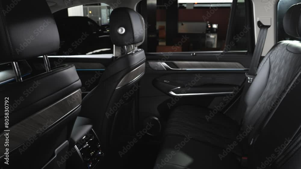 Car interior shot in a black studio. Artificial lighting. Slow camera movement Car interior shot in a black studio. Artificial lighting. Slow camera movement