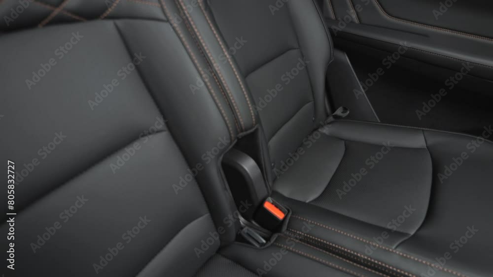 Car interior shot in a black studio. Artificial lighting. Slow camera movement Car interior shot in a black studio. Artificial lighting. Slow camera movement
