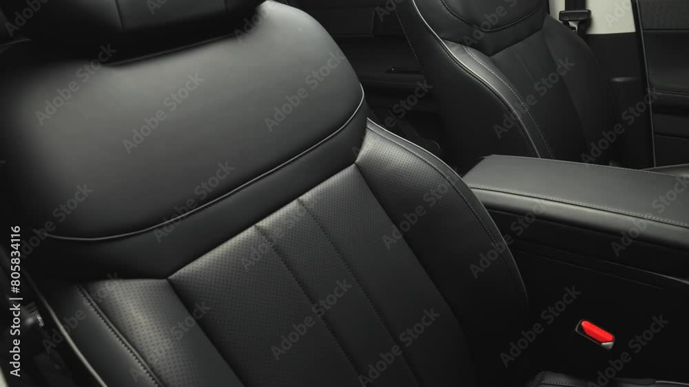 Car interior shot in a black studio. Artificial lighting. Slow camera movement Car interior shot in a black studio. Artificial lighting. Slow camera movement