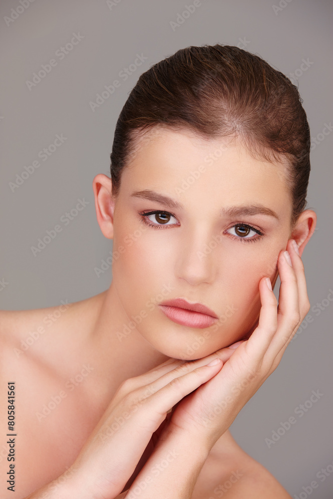 Skincare, beauty and portrait of model in studio for wellness, dermatology or facial treatment with gray background. Cosmetology, serious and woman for healthy skin, luxury salon or natural glow Skincare, beauty and portrait of model in studio for wellness, dermatology or facial treatment with gray background. Cosmetology, serious and woman for healthy skin, luxury salon or natural glow