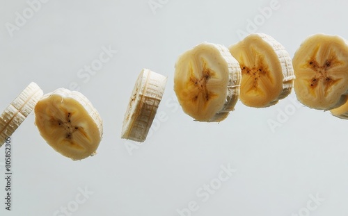 close up of a sliced banana in the air photo