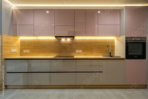 A minimalist kitchen with pastelcolored cabinets and soft lighting for a warm  inviting feel