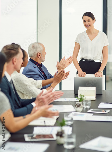 Office, business people and applause for woman after presentation, success and company achievement. Professional, hr team or employee in meeting while clapping hands, support and victory in workplace