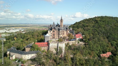 Aerial view of famous Castle Wernigerode, in beautiful golden evening light, Saxony-Anhalt, Germany. High quality 4k footage