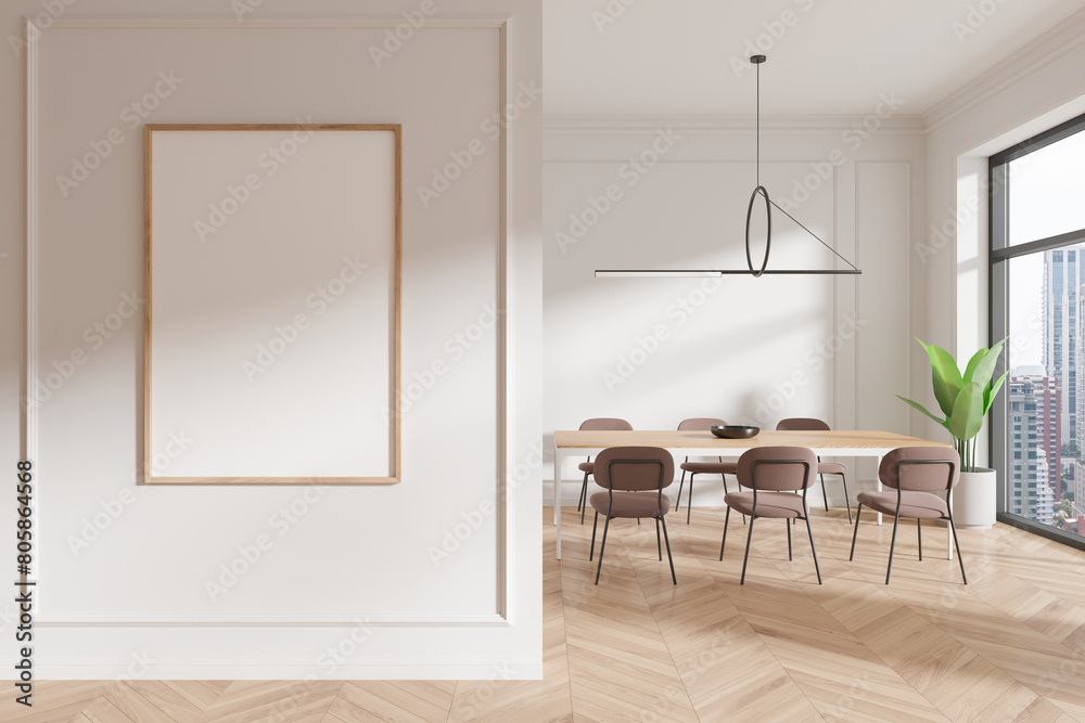 Fototapeta premium A framed blank poster on a wall in a modern dining room interior with large windows, light background, concept of mockup. 3D Rendering