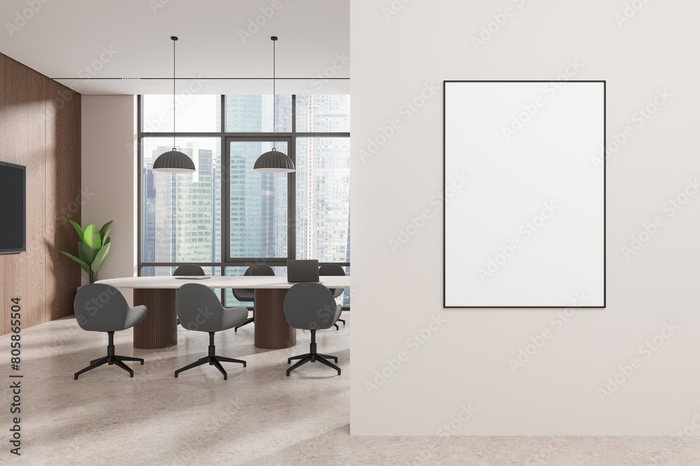 Modern office interior with a meeting area, large windows, and an empty poster on the wall, light tones, concept of corporate space. 3D Rendering