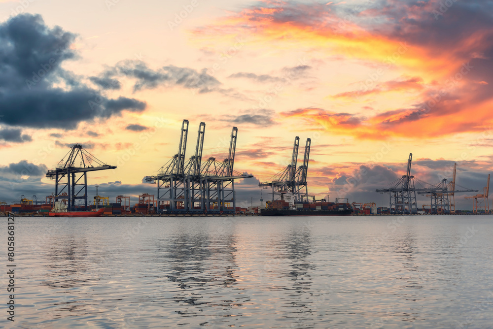 Logistic transportation sea freight, Cargo ship Cargo container in deep sea port at industrial estate for import export around in the world Logistic transportation sea freight, Cargo ship Cargo container in deep sea port at industrial estate for import export around in the world