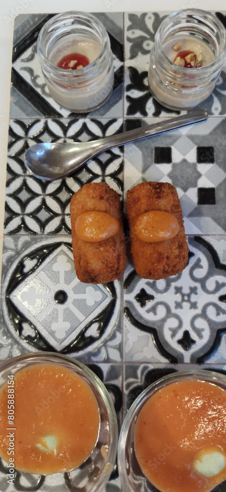 aperitive food with croquetes gazpacho and other food stuff aperitive food with croquetes gazpacho and other food stuff