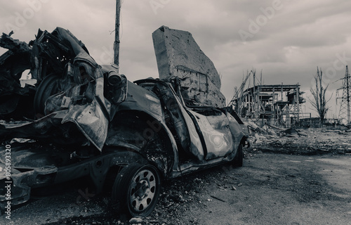 burnt cars and destroyed buildings of the workshop of the Azovstal plant in Mariupol photo