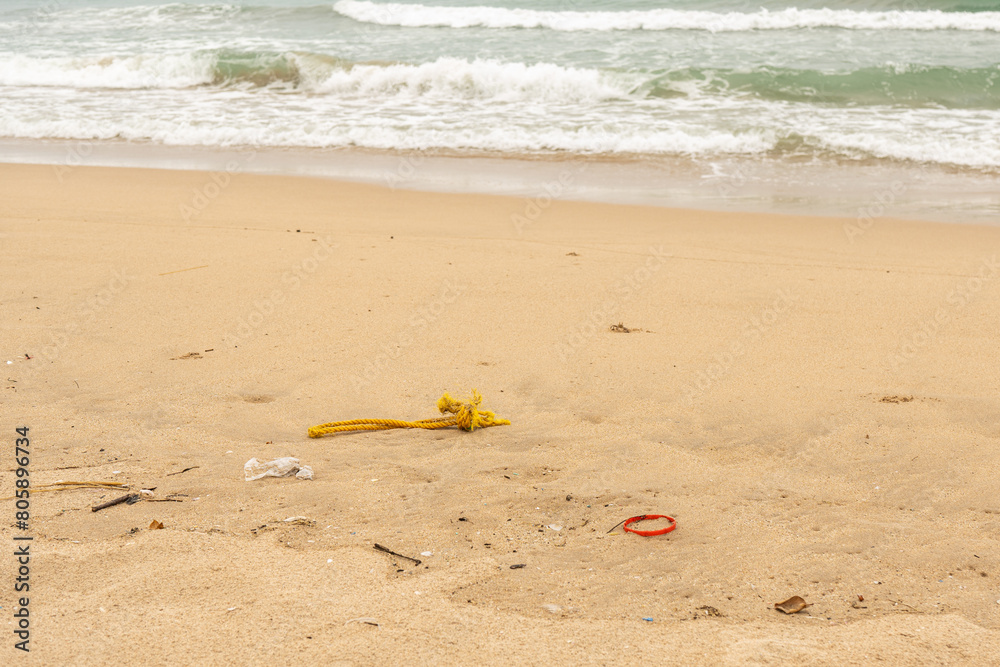 Sri Lanka, Bottles of plastic and garbage on the sand on the beach near the ocean, sea pollution catastrophe. Sri Lanka, Bottles of plastic and garbage on the sand on the beach near the ocean, sea pollution catastrophe.