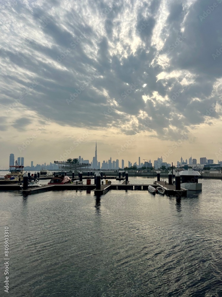 Modern city harbor with buildings and skyscrapers silhouette background