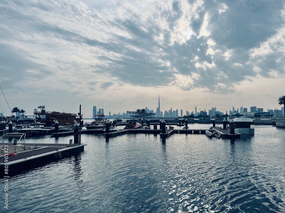 Modern city harbor with buildings and skyscrapers silhouette background