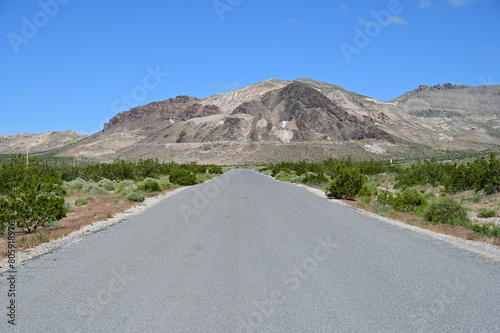 Country road leading to the Ghost town of Rhyolite in Nevada.